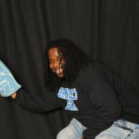 taking a picture with the foam finger